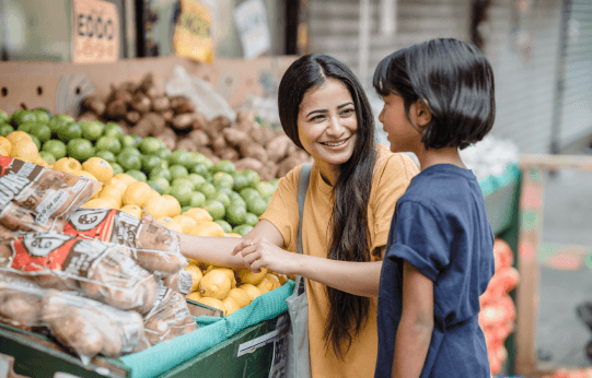 Fresh groceries in shopping bag